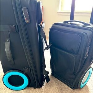 GRO Luggage, charges phone, has combo lock- in great shape! Used a few trips!